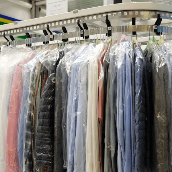 Recently pressed and dry cleaned clothes by Orr Cleaners
